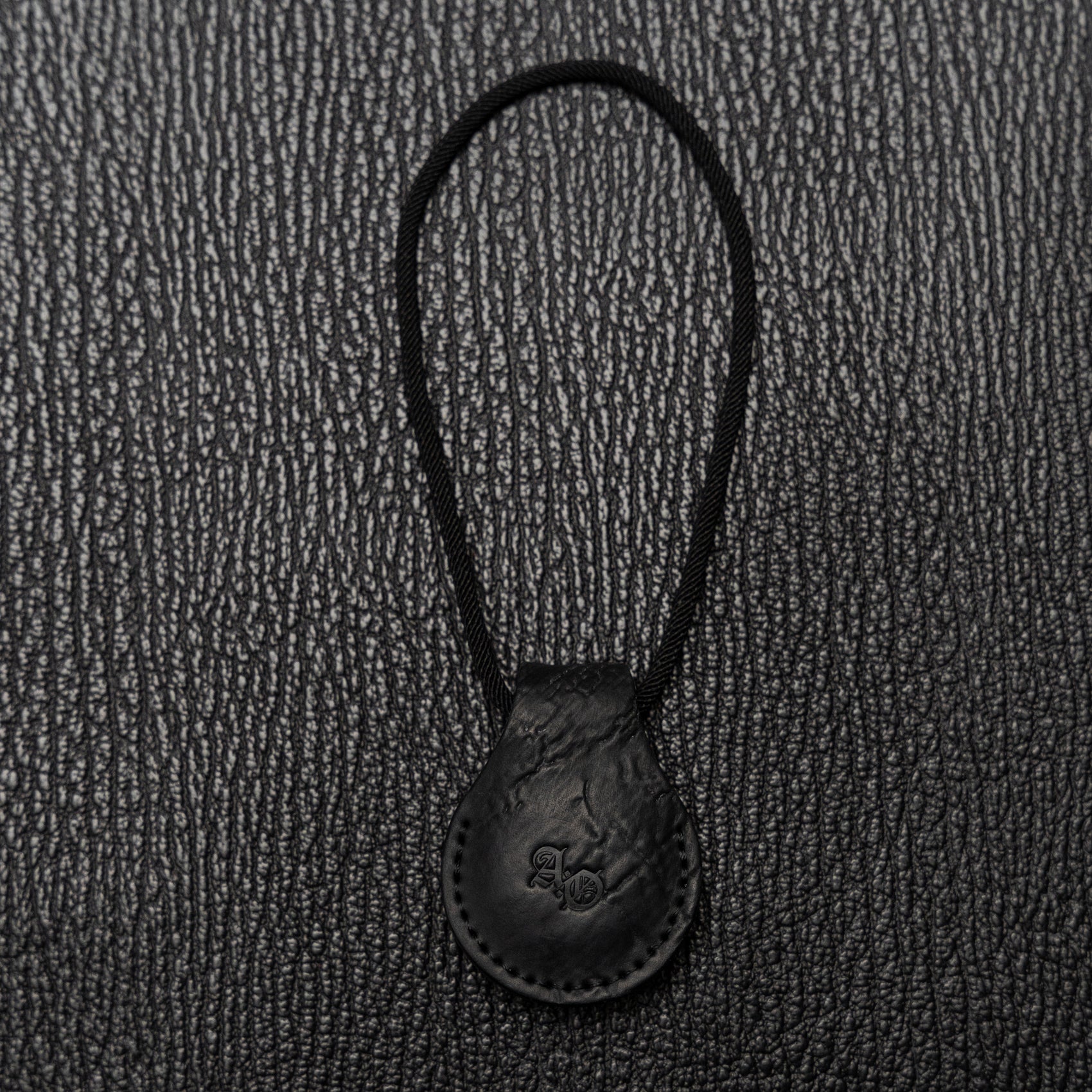 Ruta AirTag Fob w/ Cord (Reverse Culatta Black)